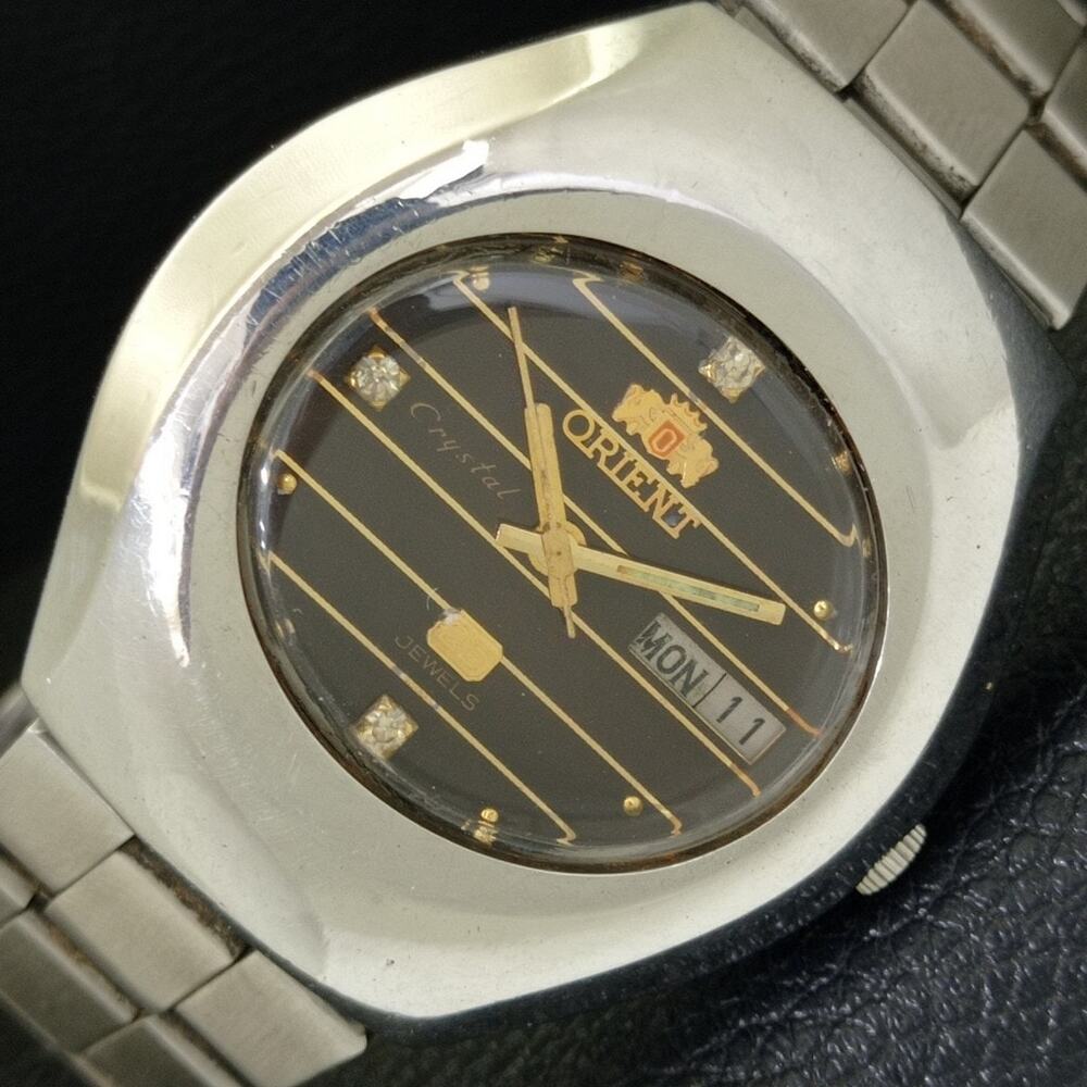 Vintage 1976 Orient Automatic Mens Silver Watch W/daydate & Gold accents